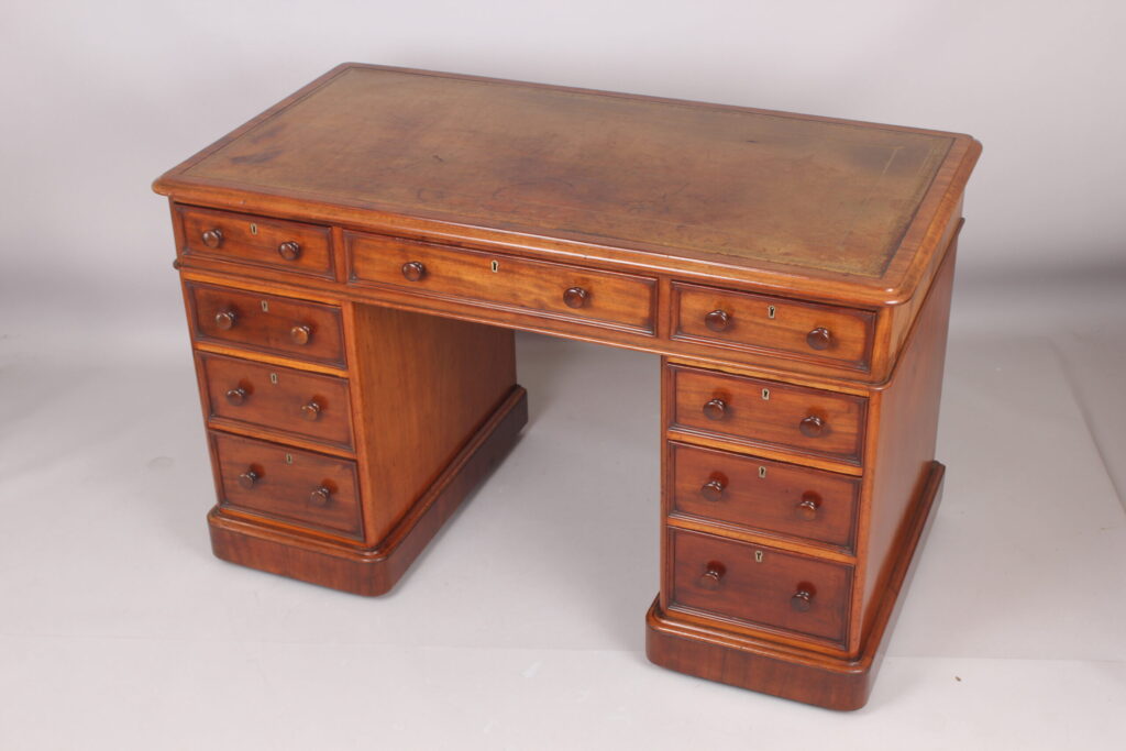 Mahogany three part pedestal desk