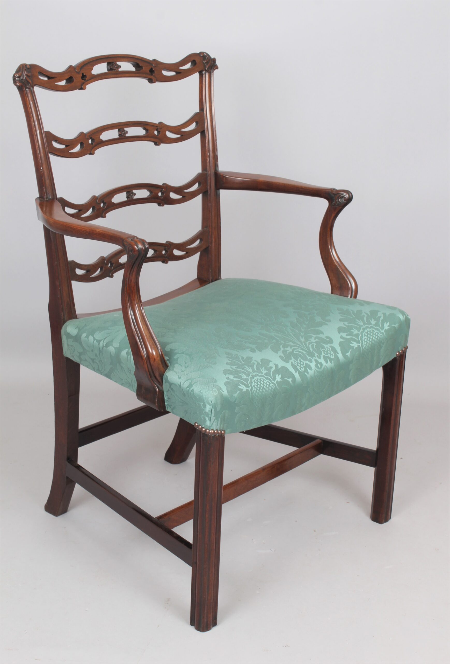 A mid 18th century mahogany desk chair