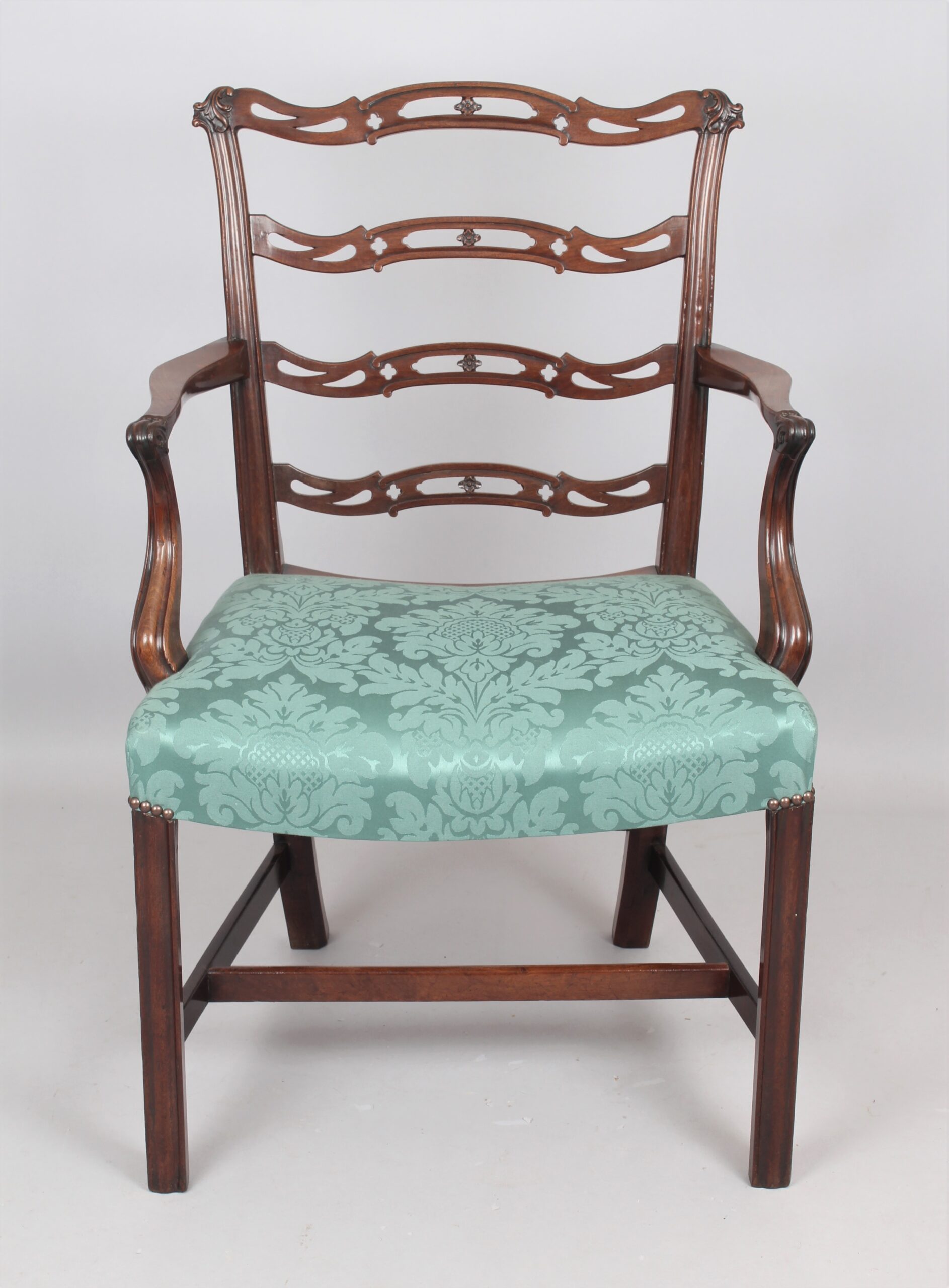 A mid 18th century mahogany desk chair