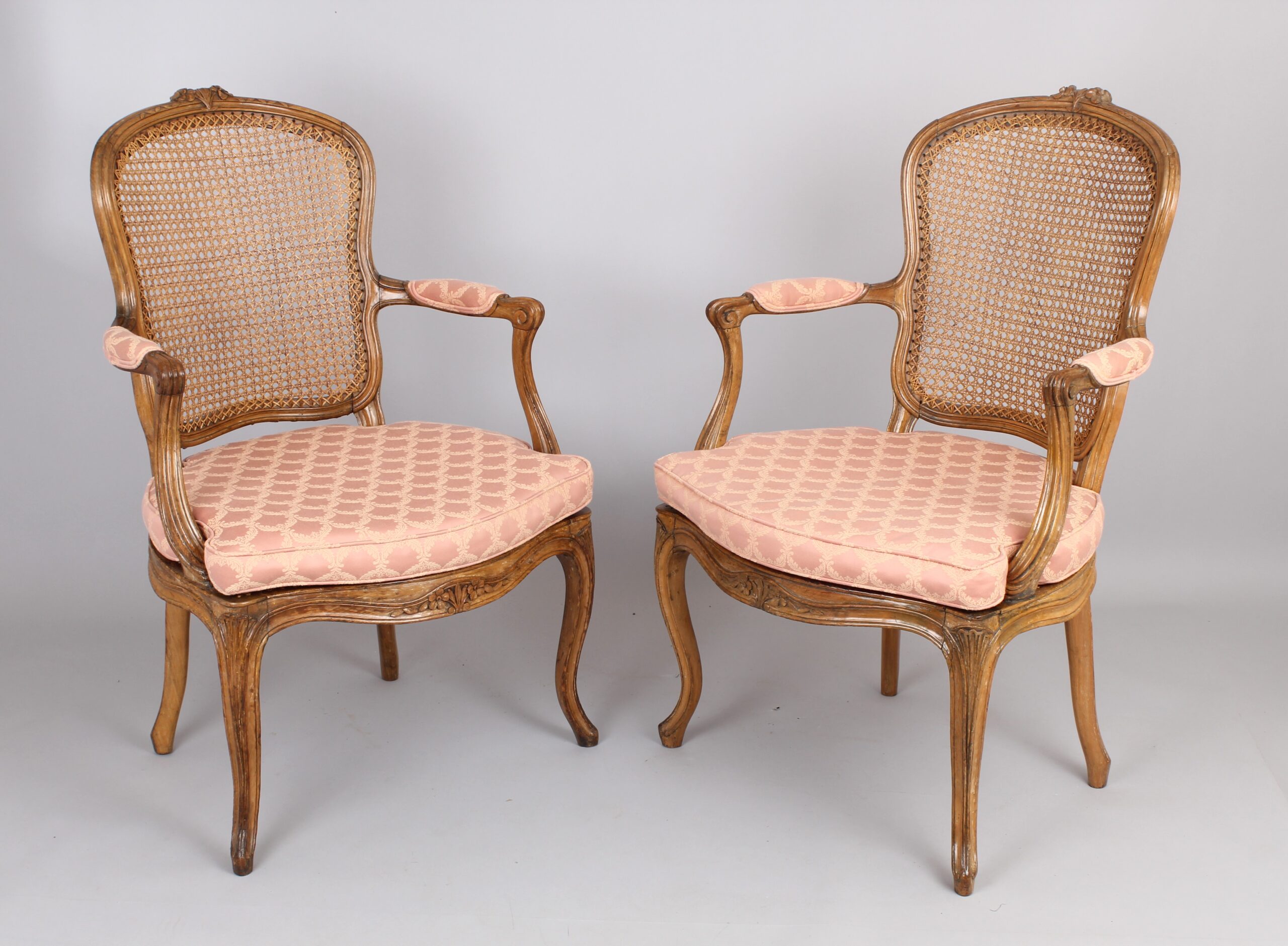 Pair of 19th century waxed beech fauteuils