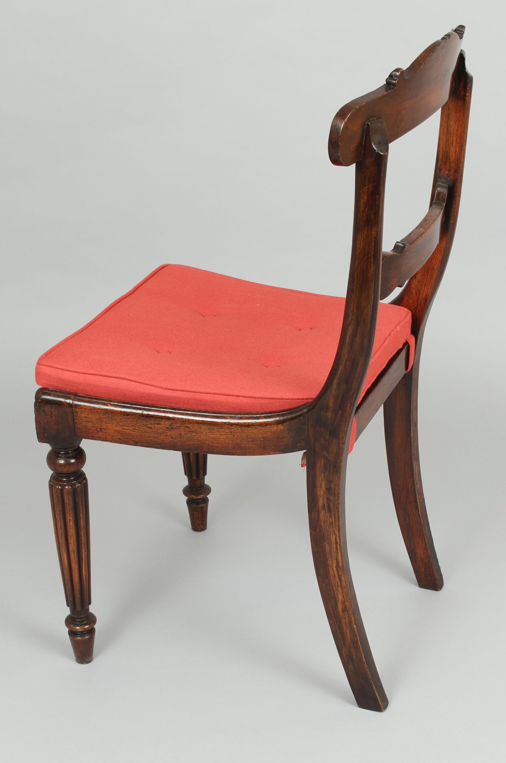 Set of eight Regency period simulated rosewood and brass inlaid chairs