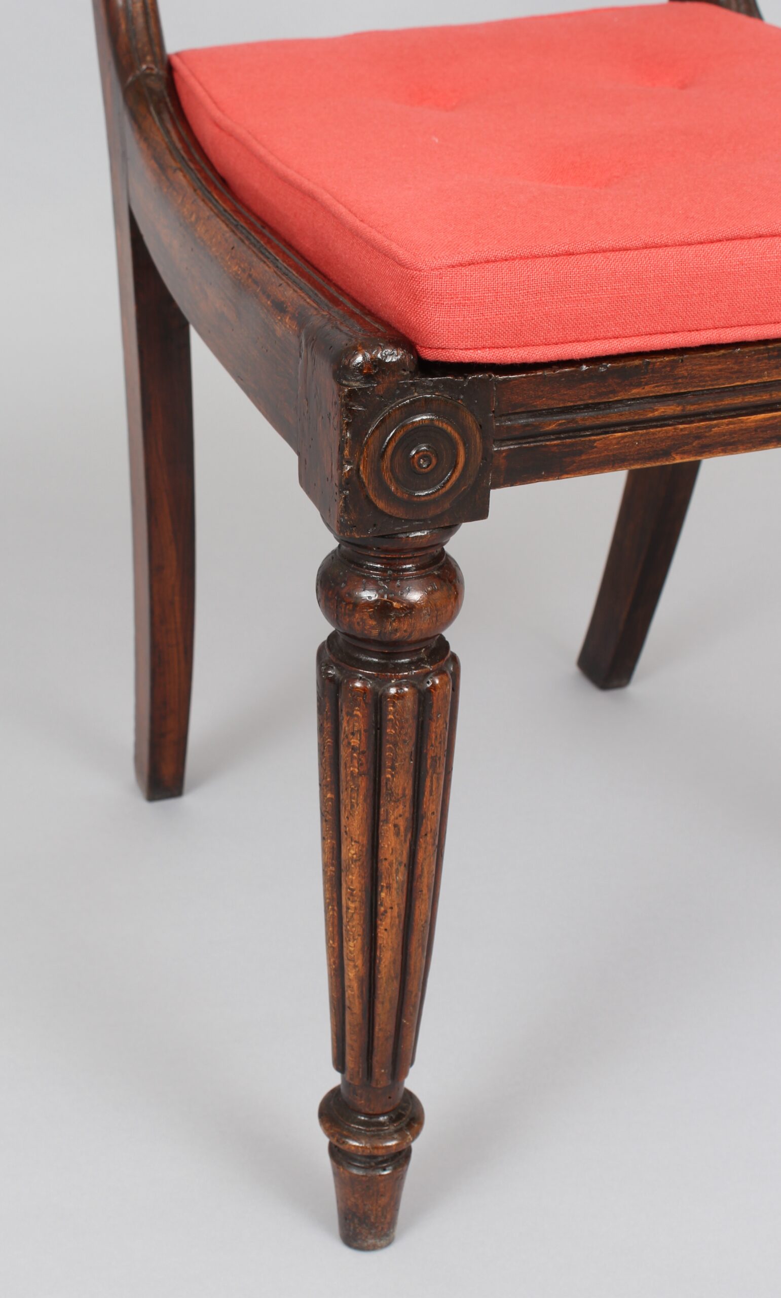 Set of eight Regency period simulated rosewood and brass inlaid chairs