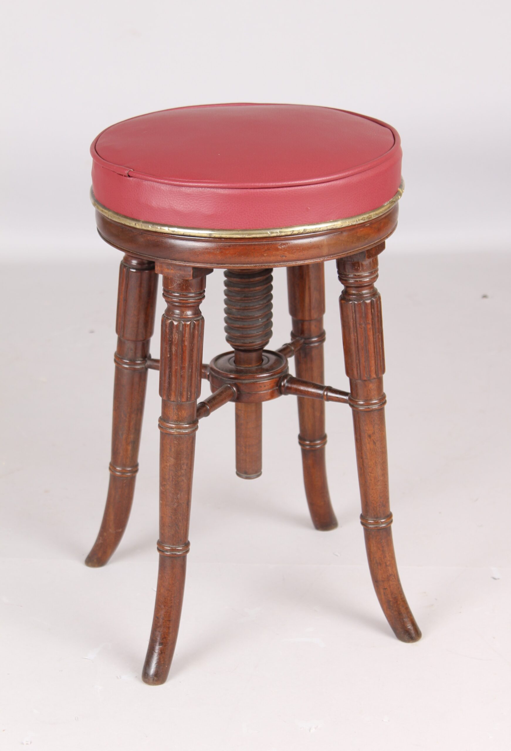 Early Victorian mahogany revolving piano stool