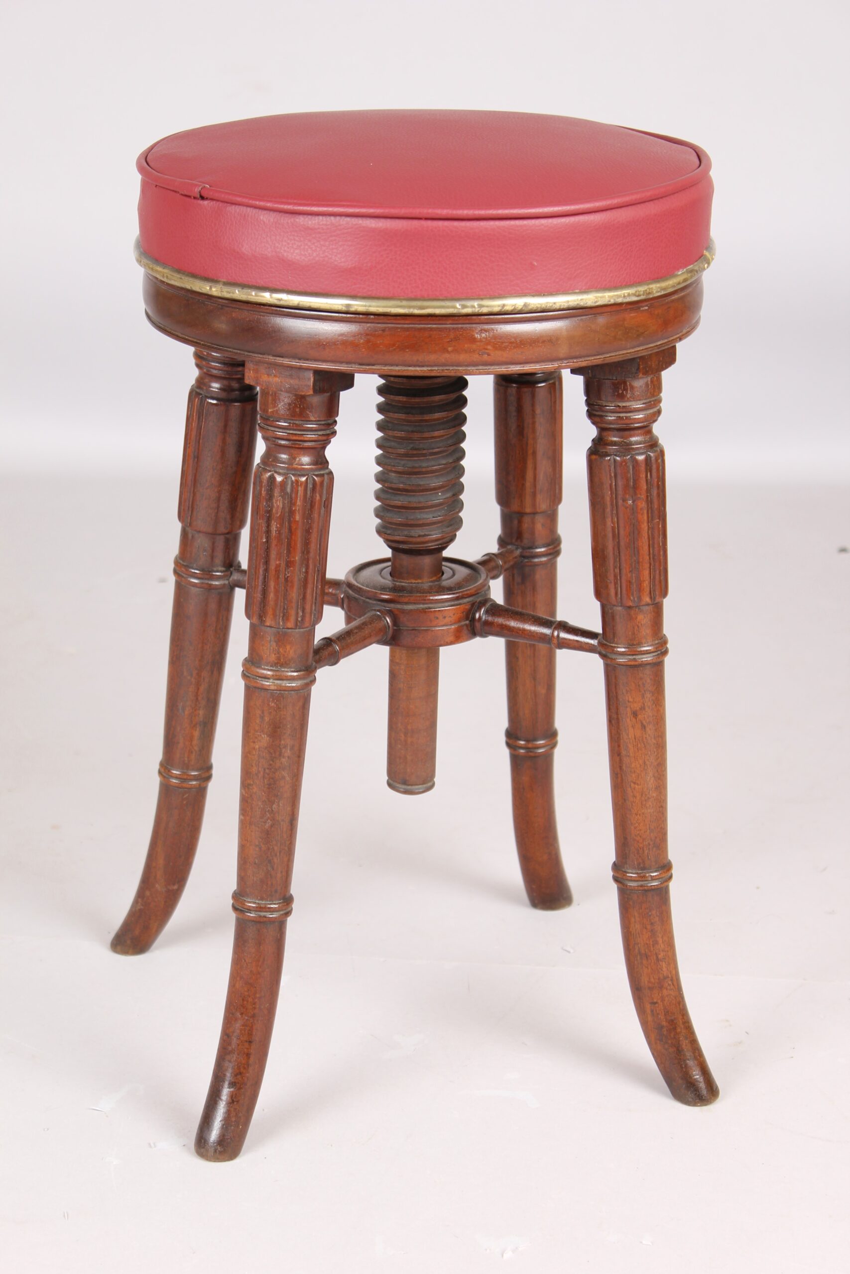 Early Victorian mahogany revolving piano stool
