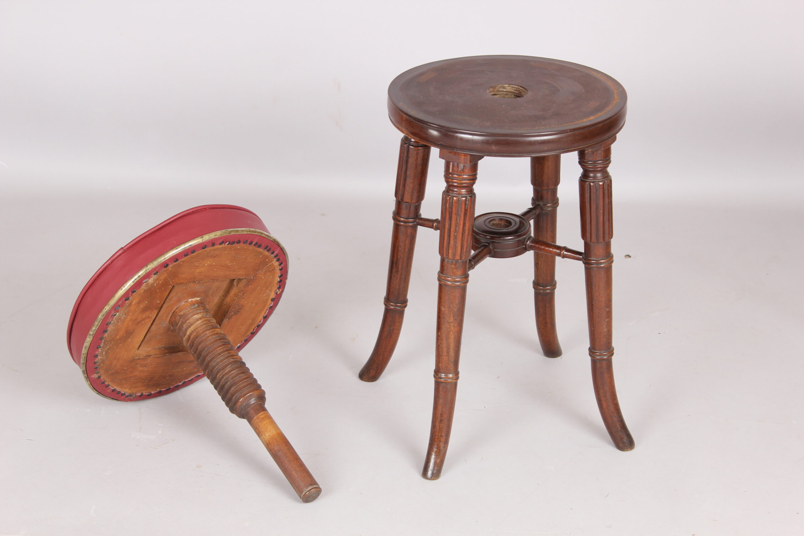 Early Victorian mahogany revolving piano stool