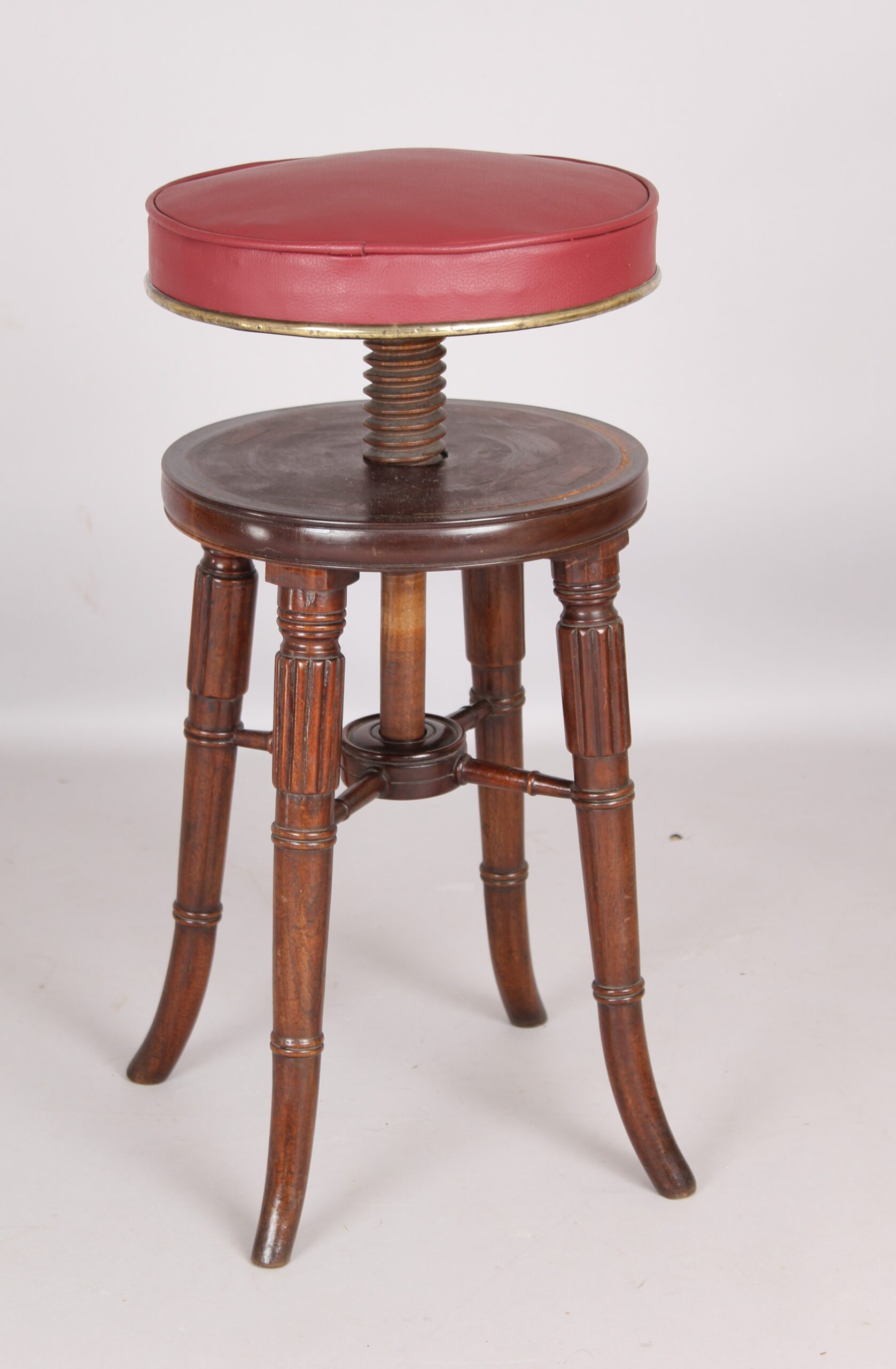 Early Victorian mahogany revolving piano stool