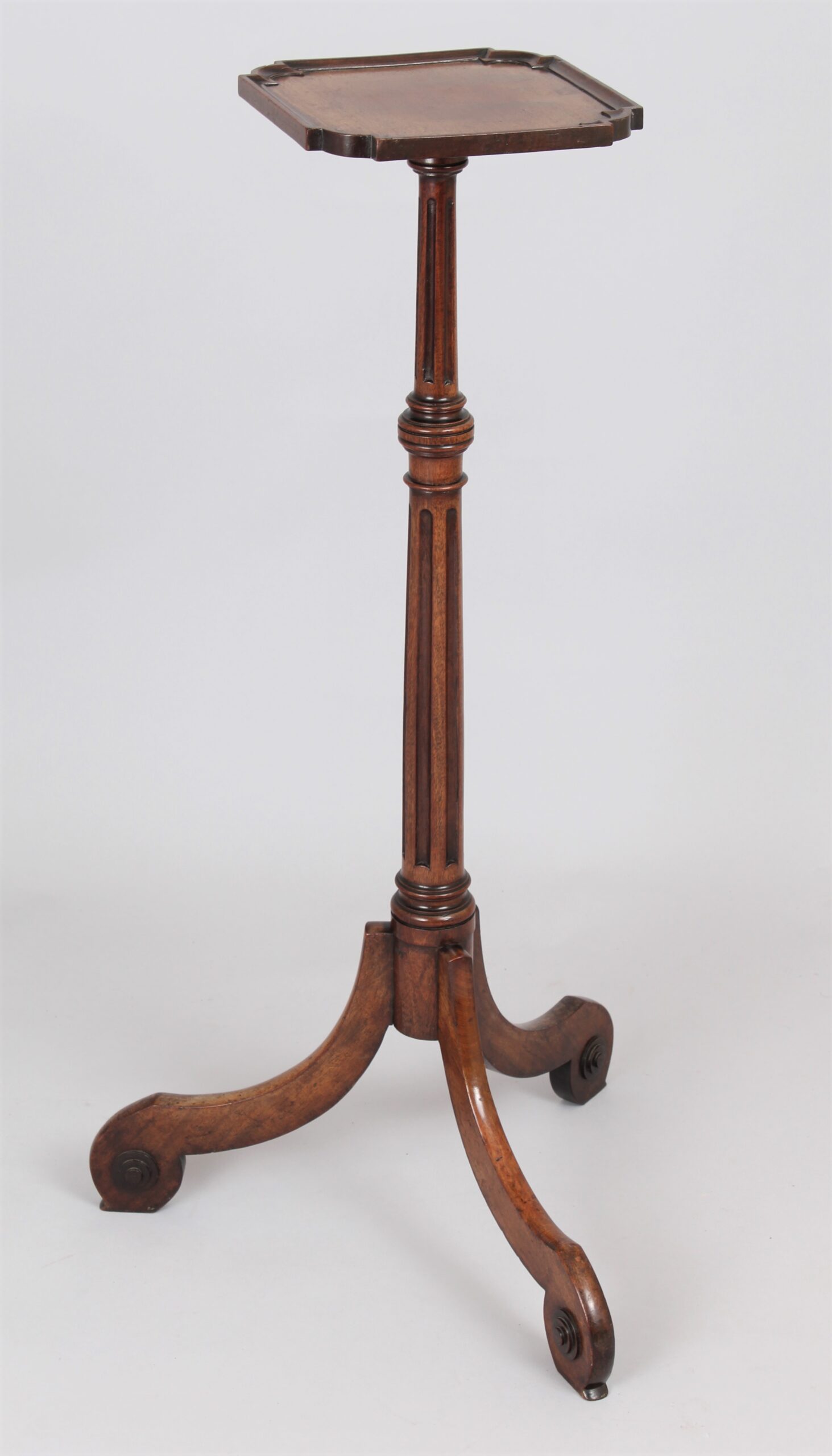 An eighteenth century Dutch walnut torchere