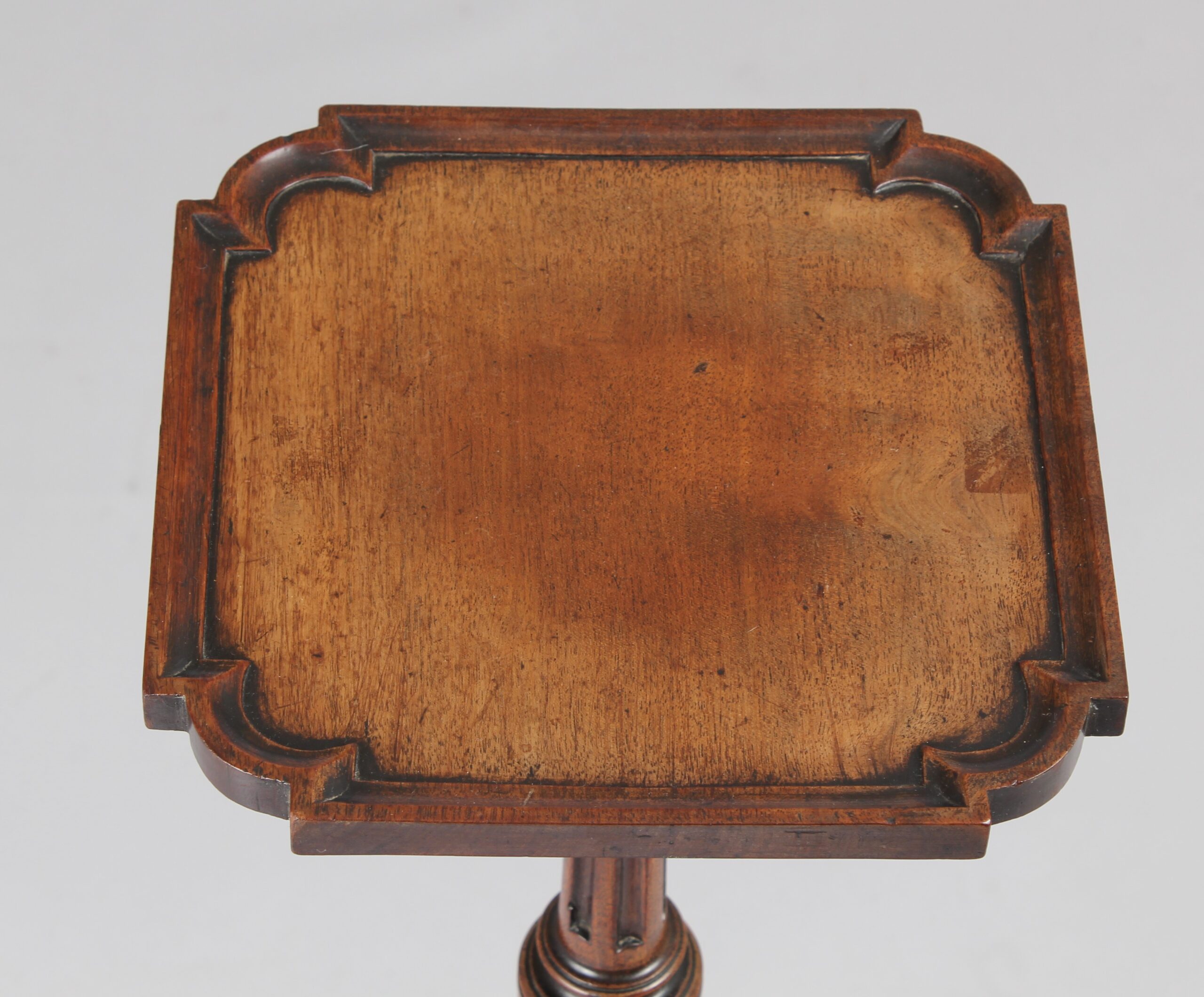 An eighteenth century Dutch walnut torchere