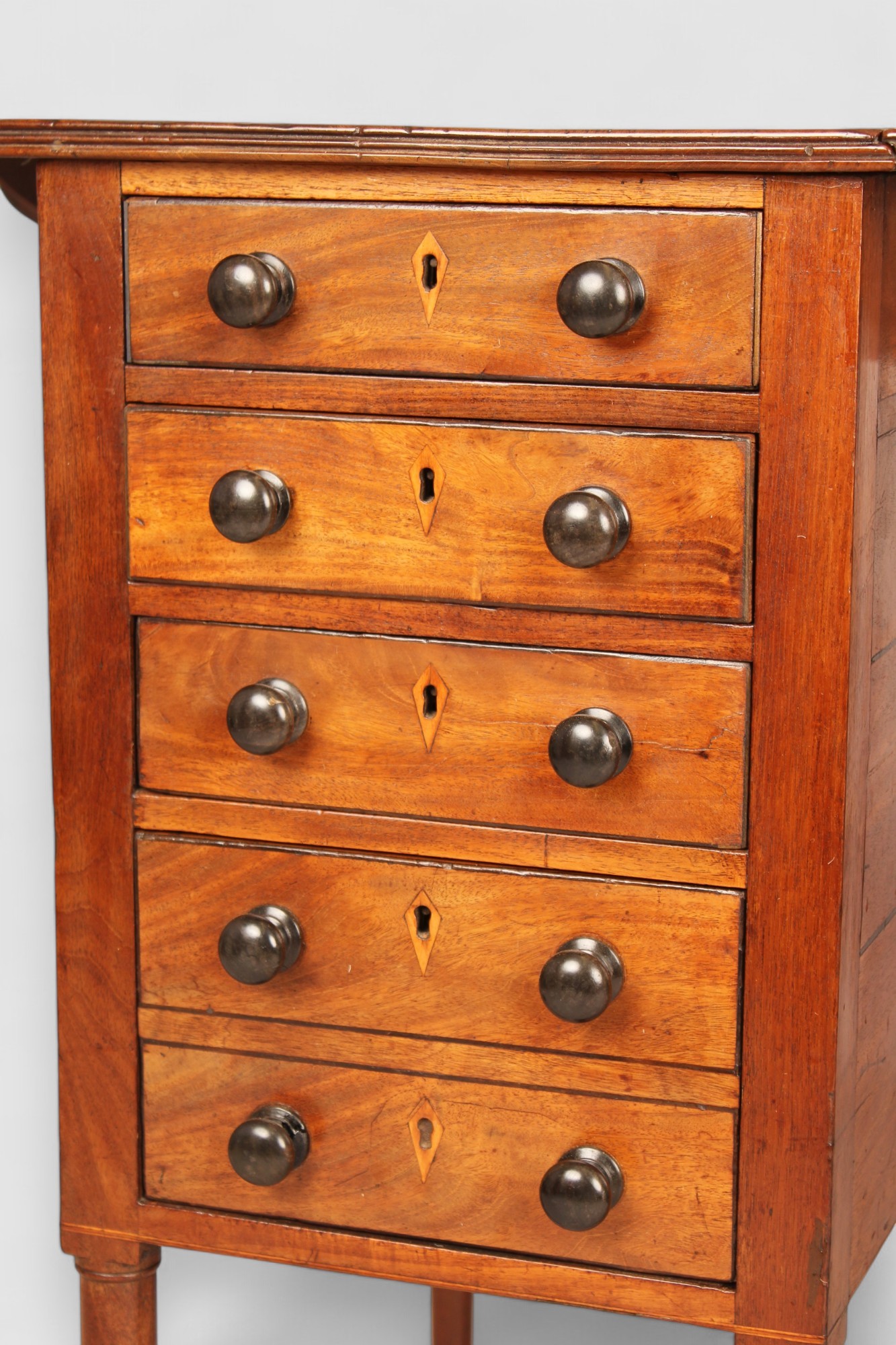A mahogany drop leaf Pembroke work table
