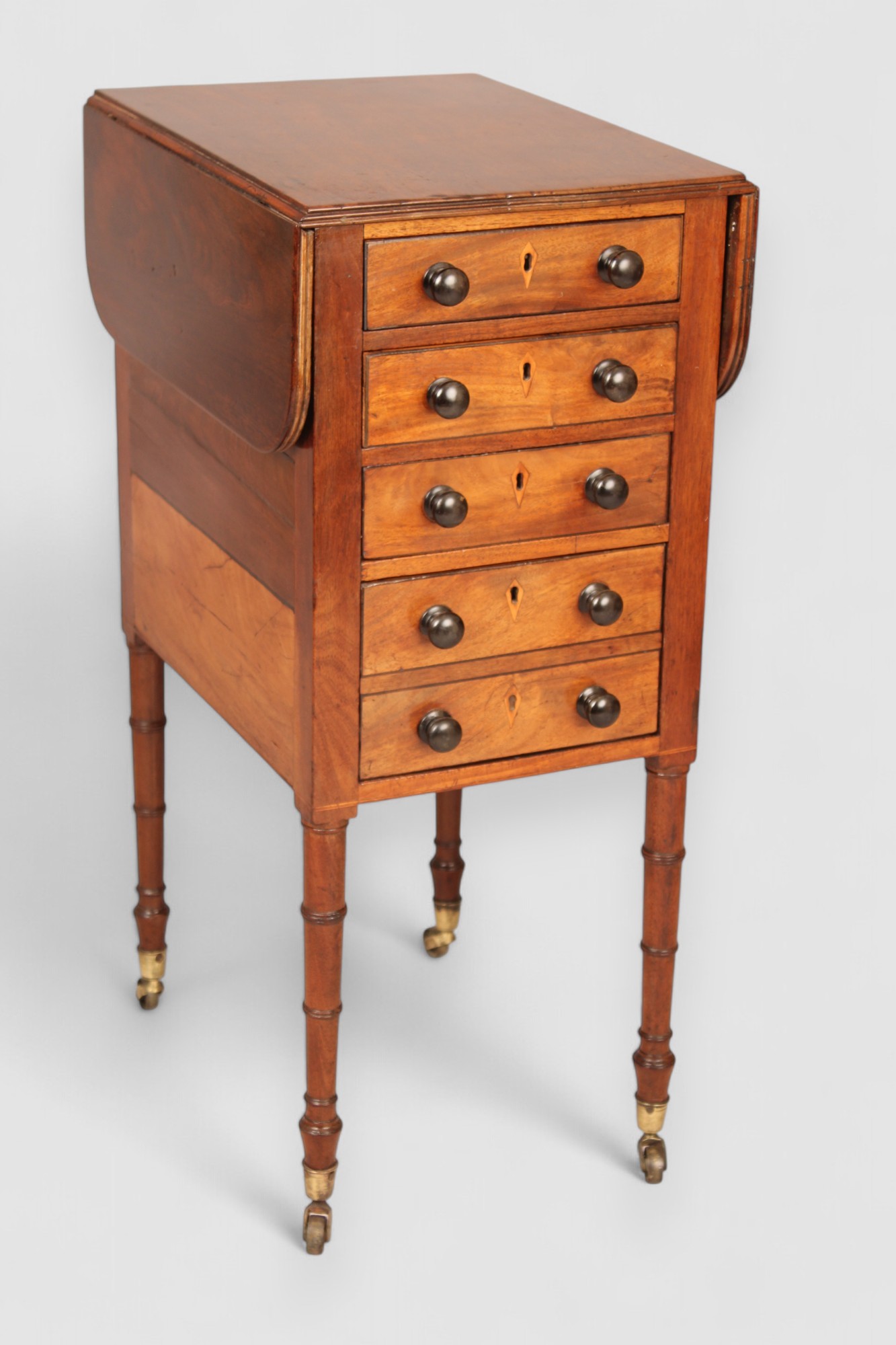 A mahogany drop leaf Pembroke work table