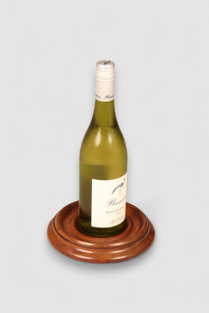 Boldly turned walnut bottle coaster