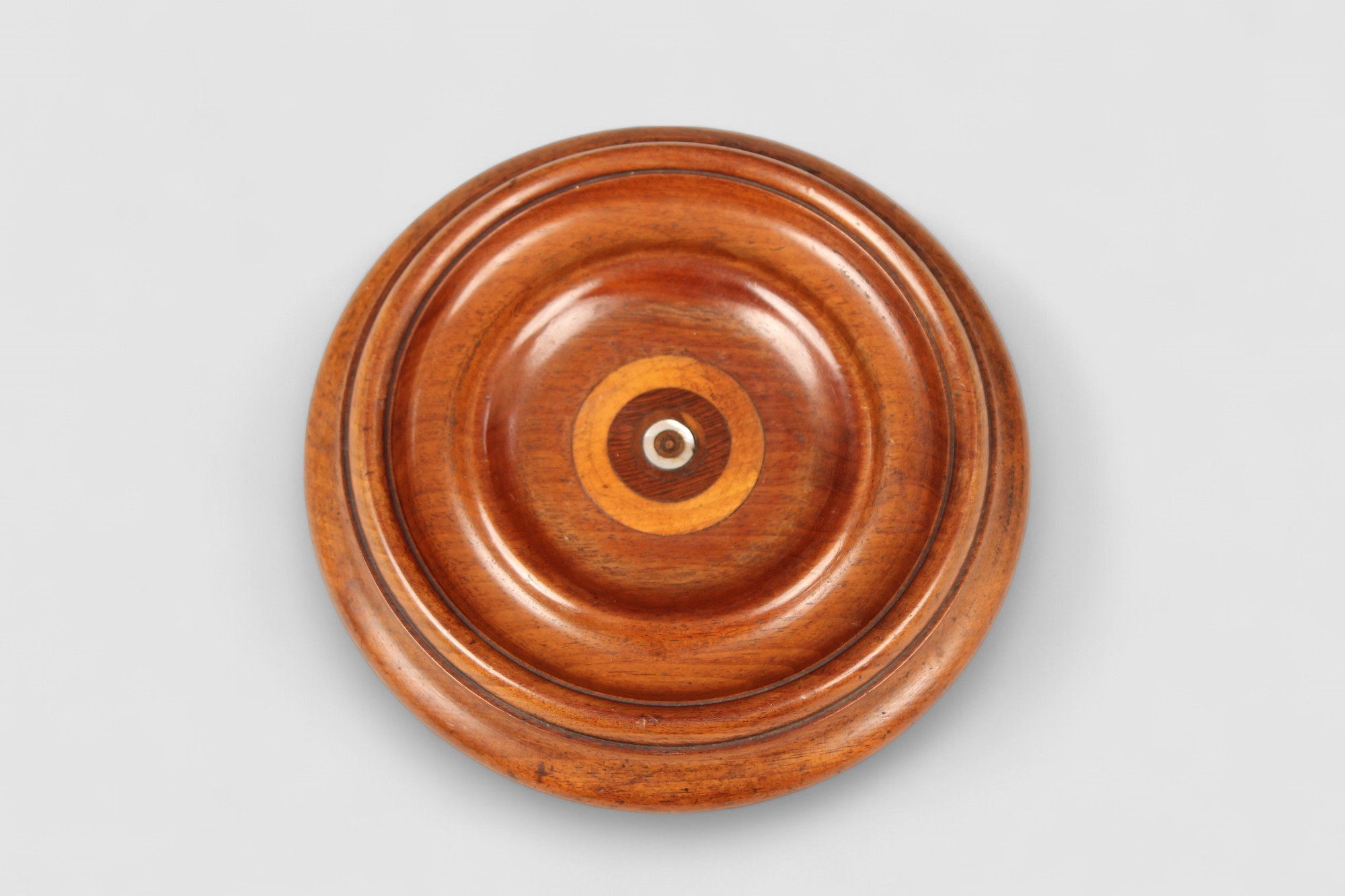Boldly turned walnut bottle coaster