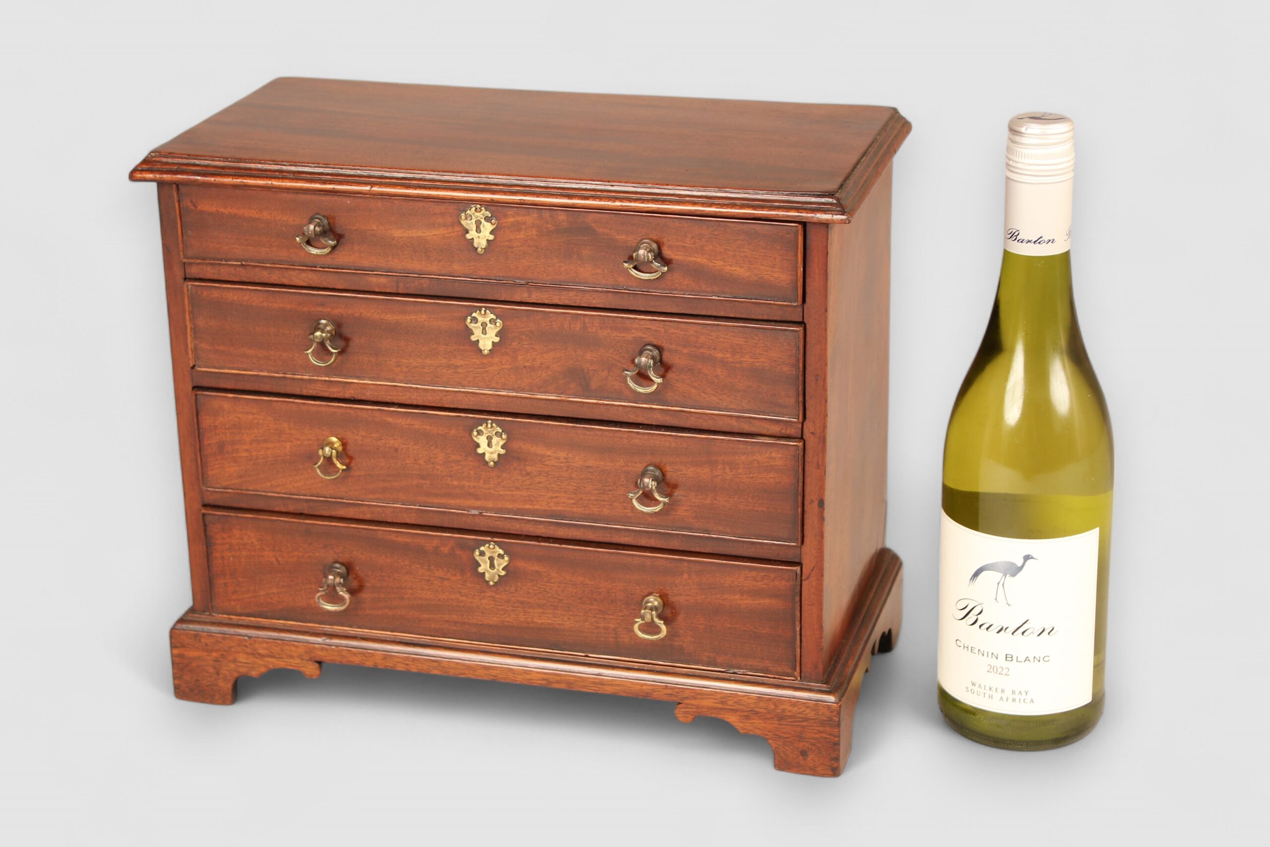 Mid 18th century mahogany miniature chest of four drawers