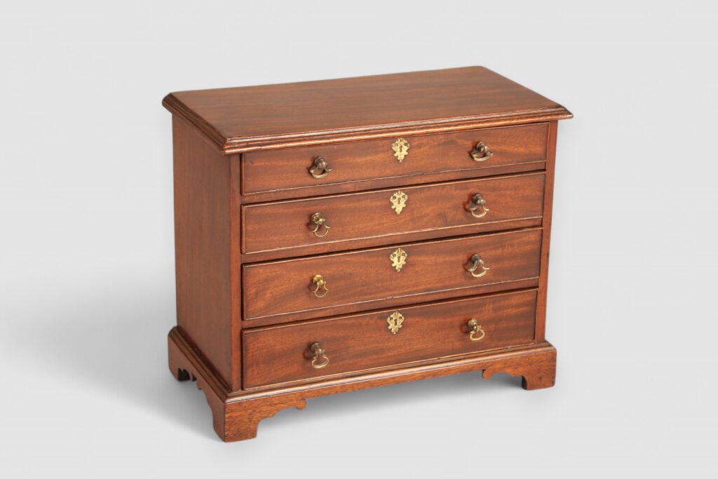 Mid 18th century mahogany miniature chest of four drawers