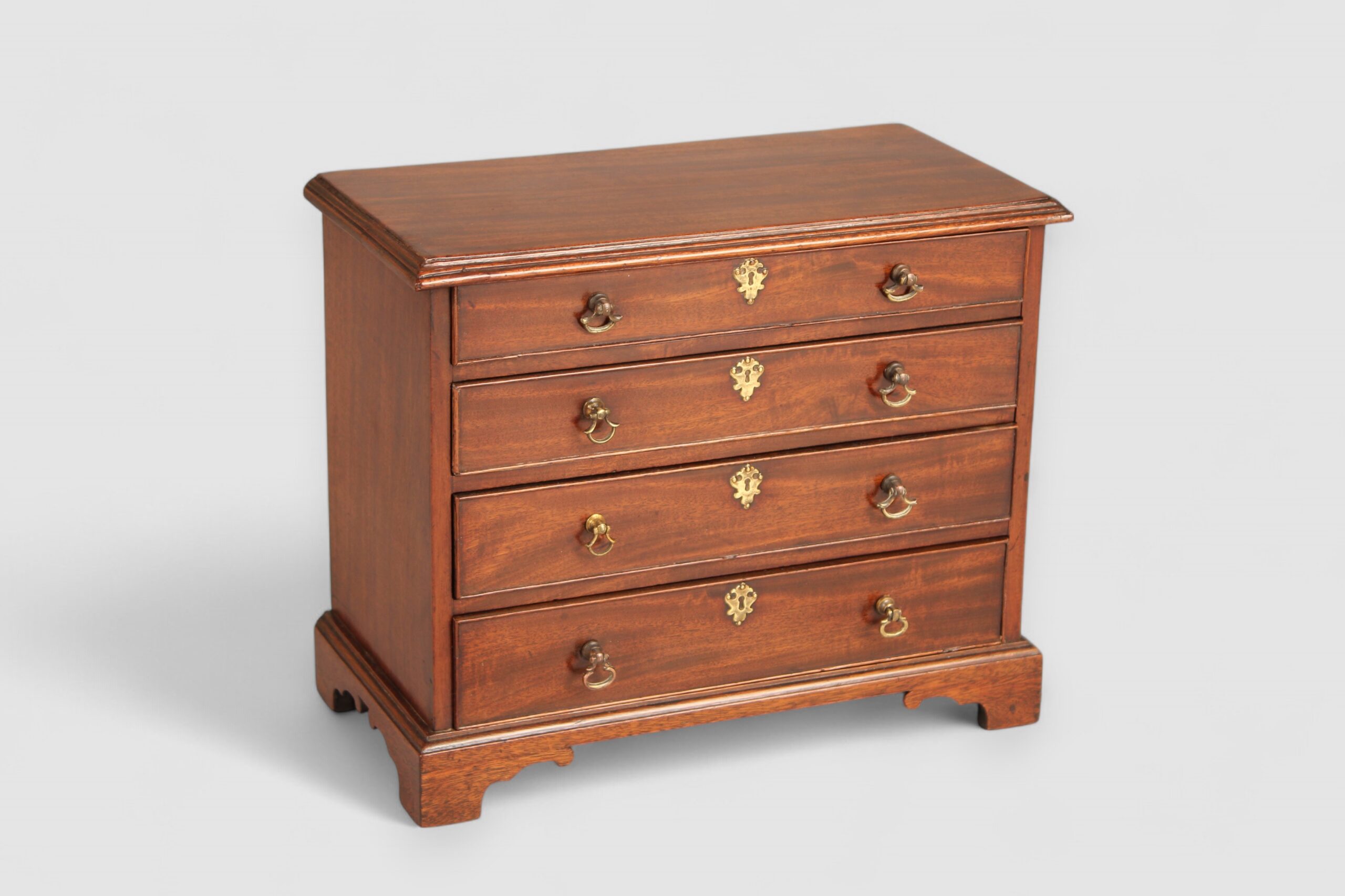 Mid 18th century mahogany miniature chest of four drawers