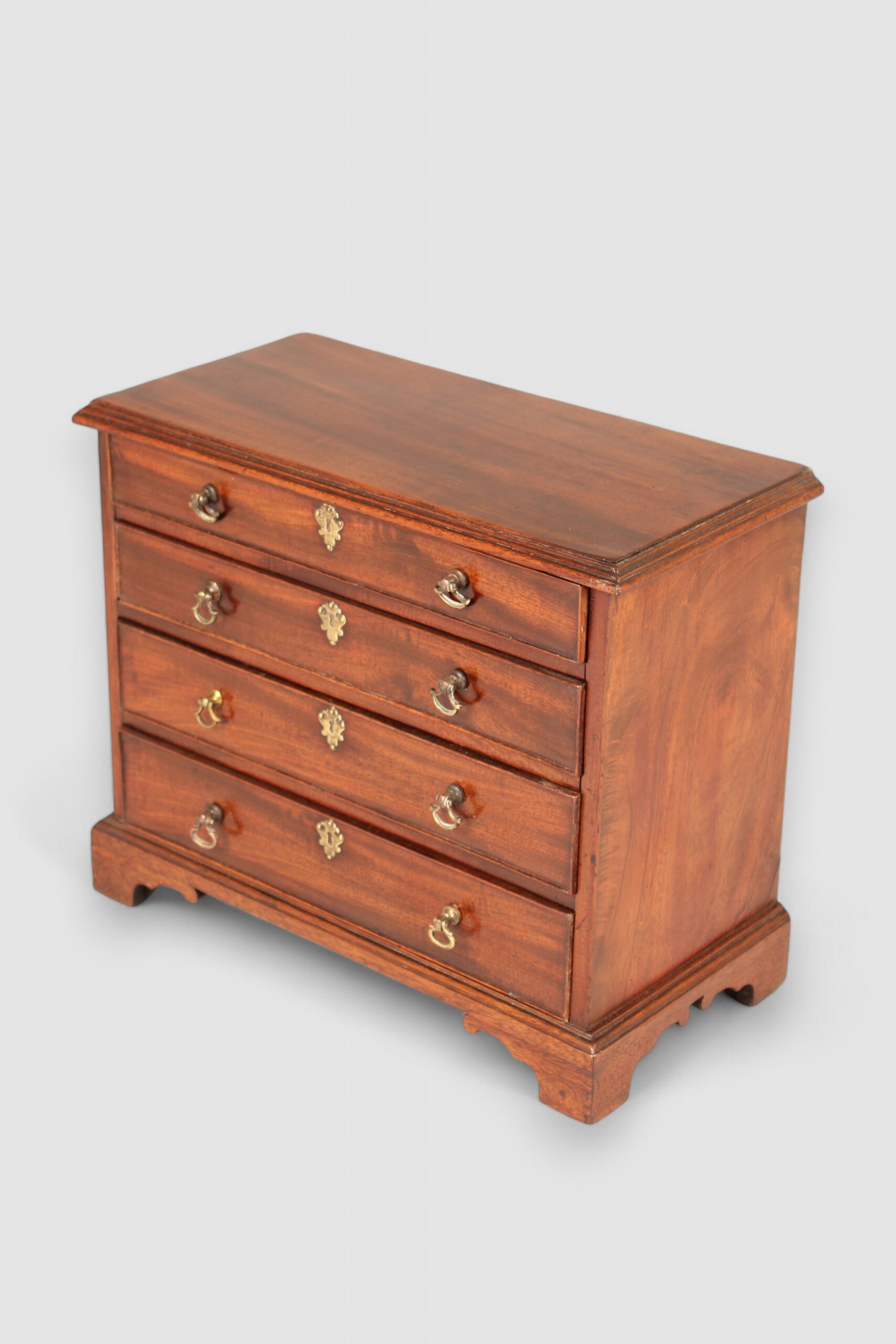 Mid 18th century mahogany miniature chest of four drawers