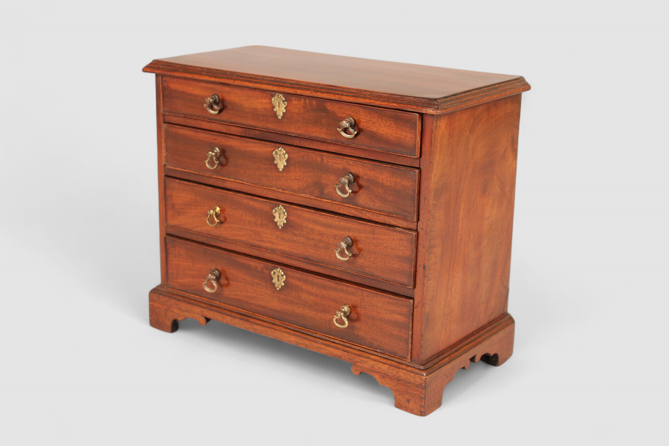 Mid 18th century mahogany miniature chest of four drawers