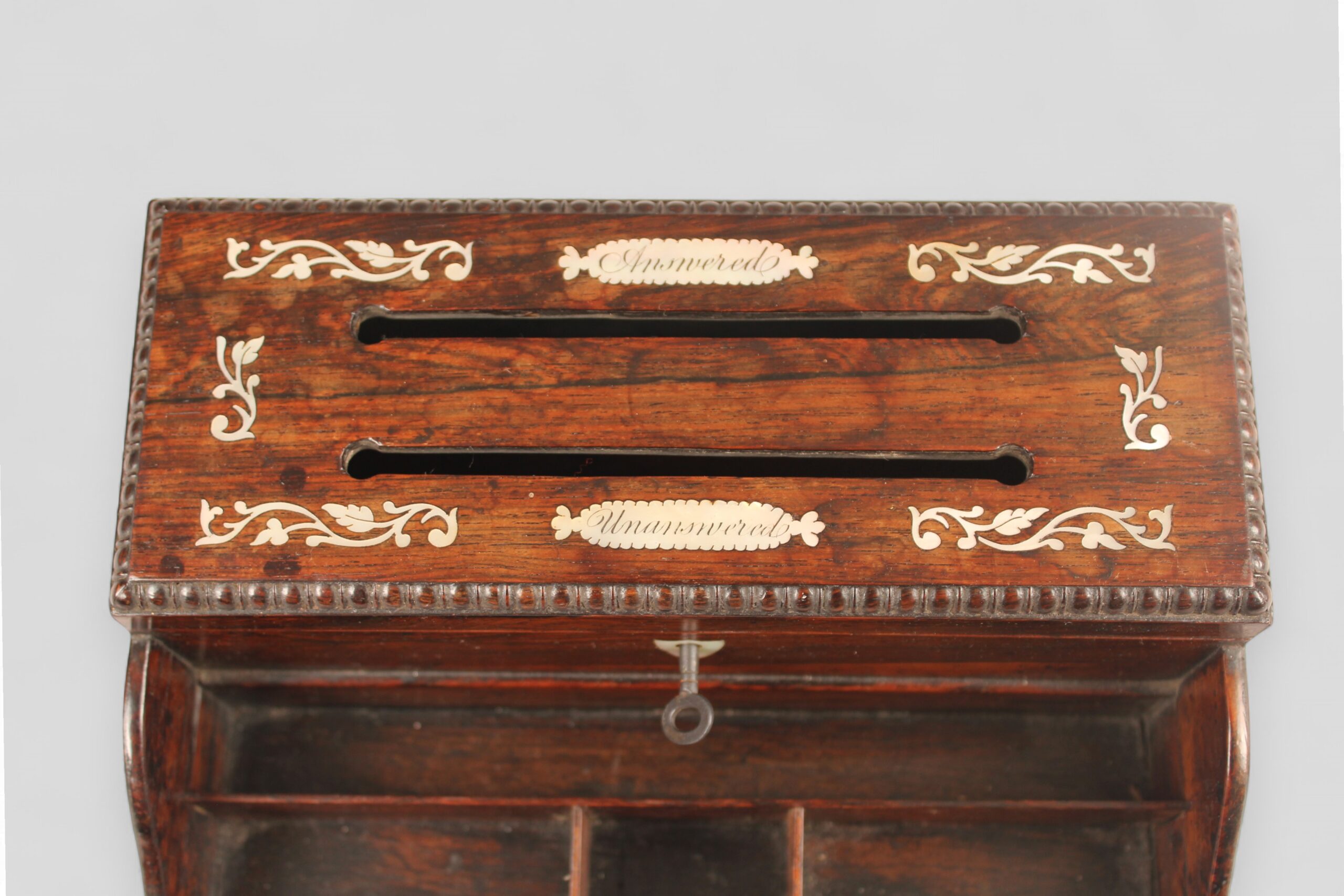 A rosewood correspondence box