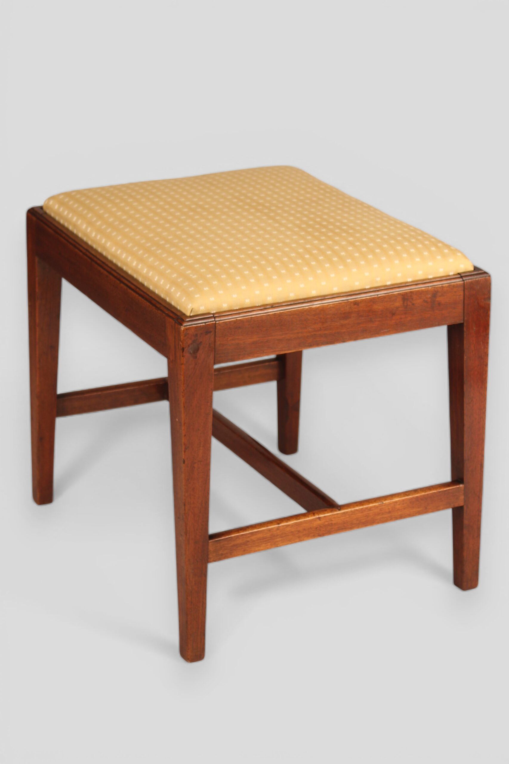 A George III mahogany stool