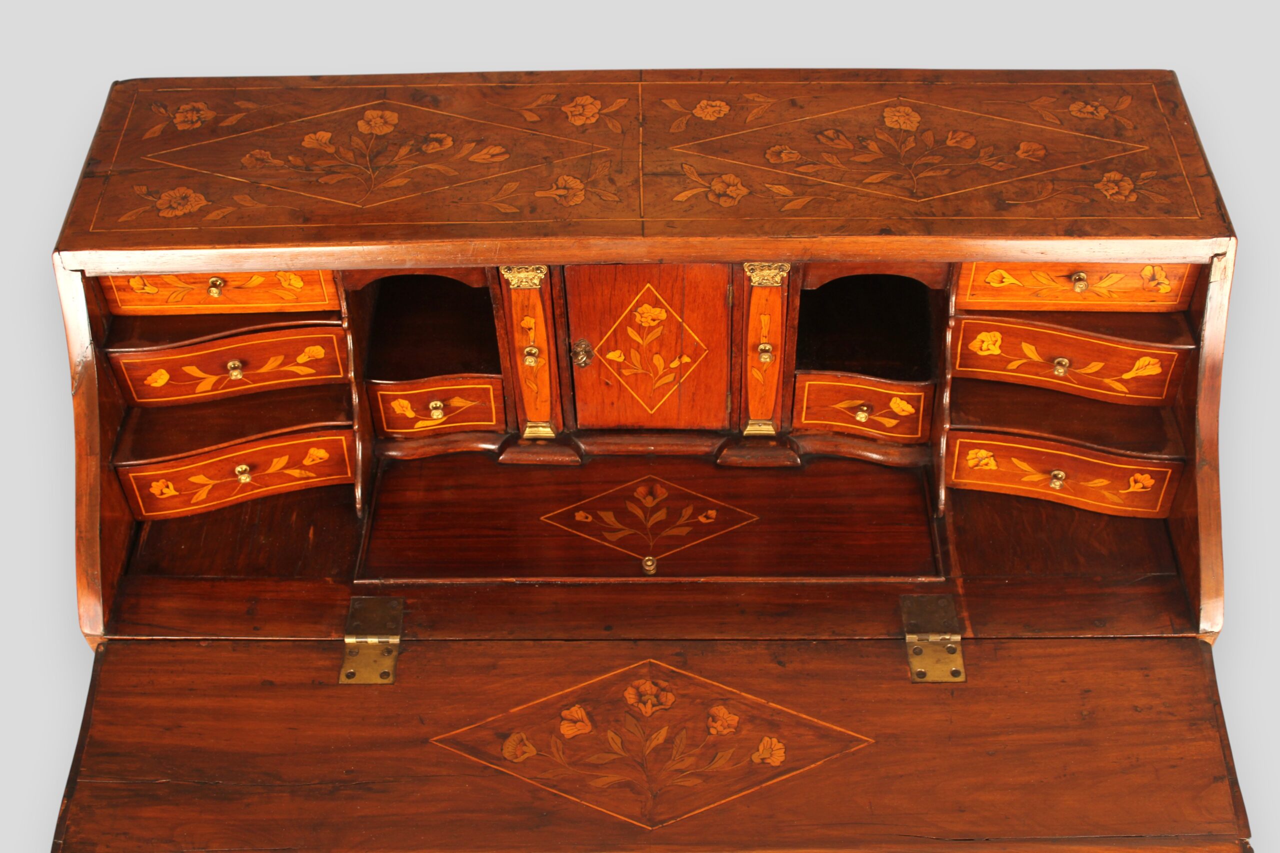 A fine 18th century walnut bombe fronted bureau