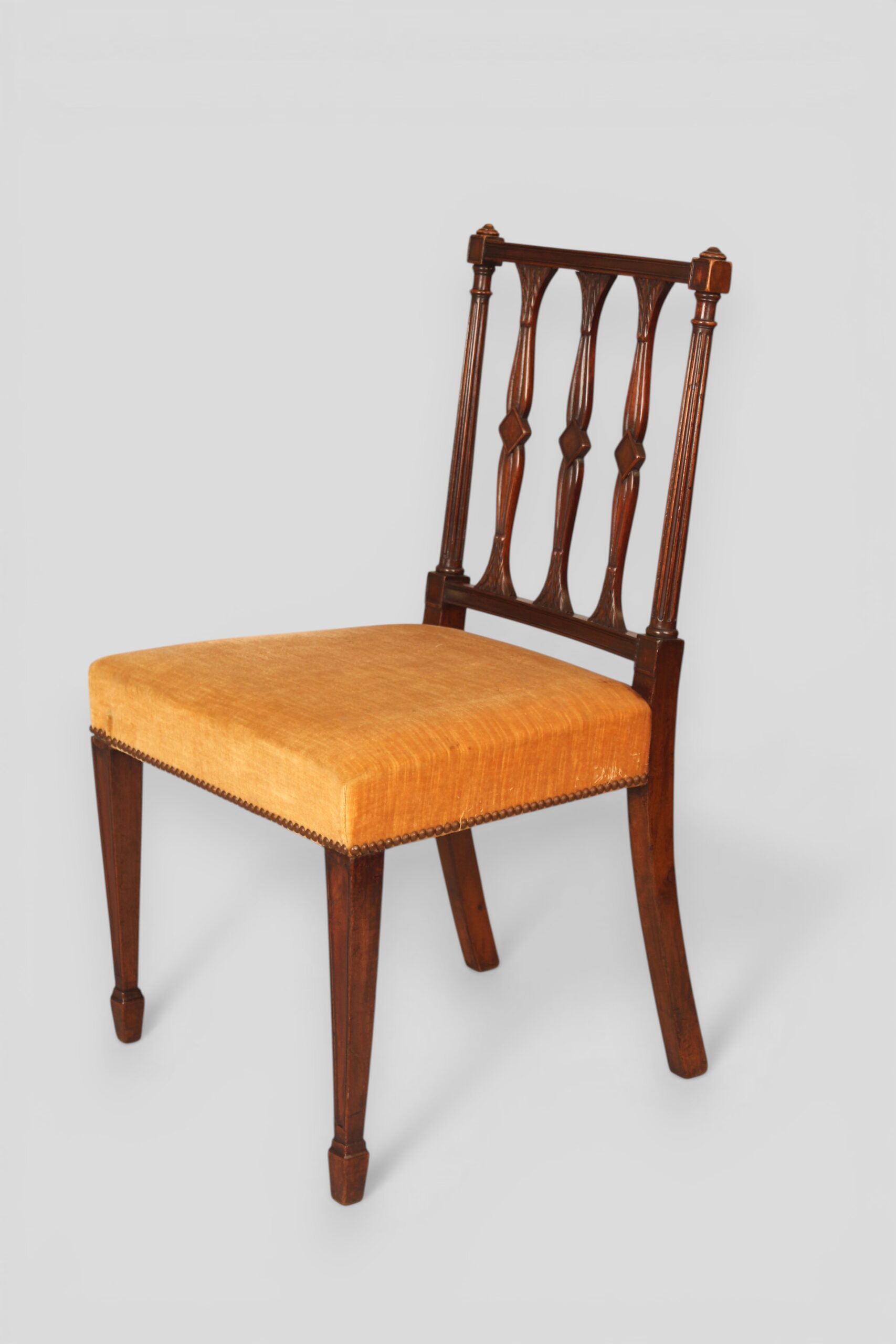 Set of six single and two carvers mahogany dining chairs