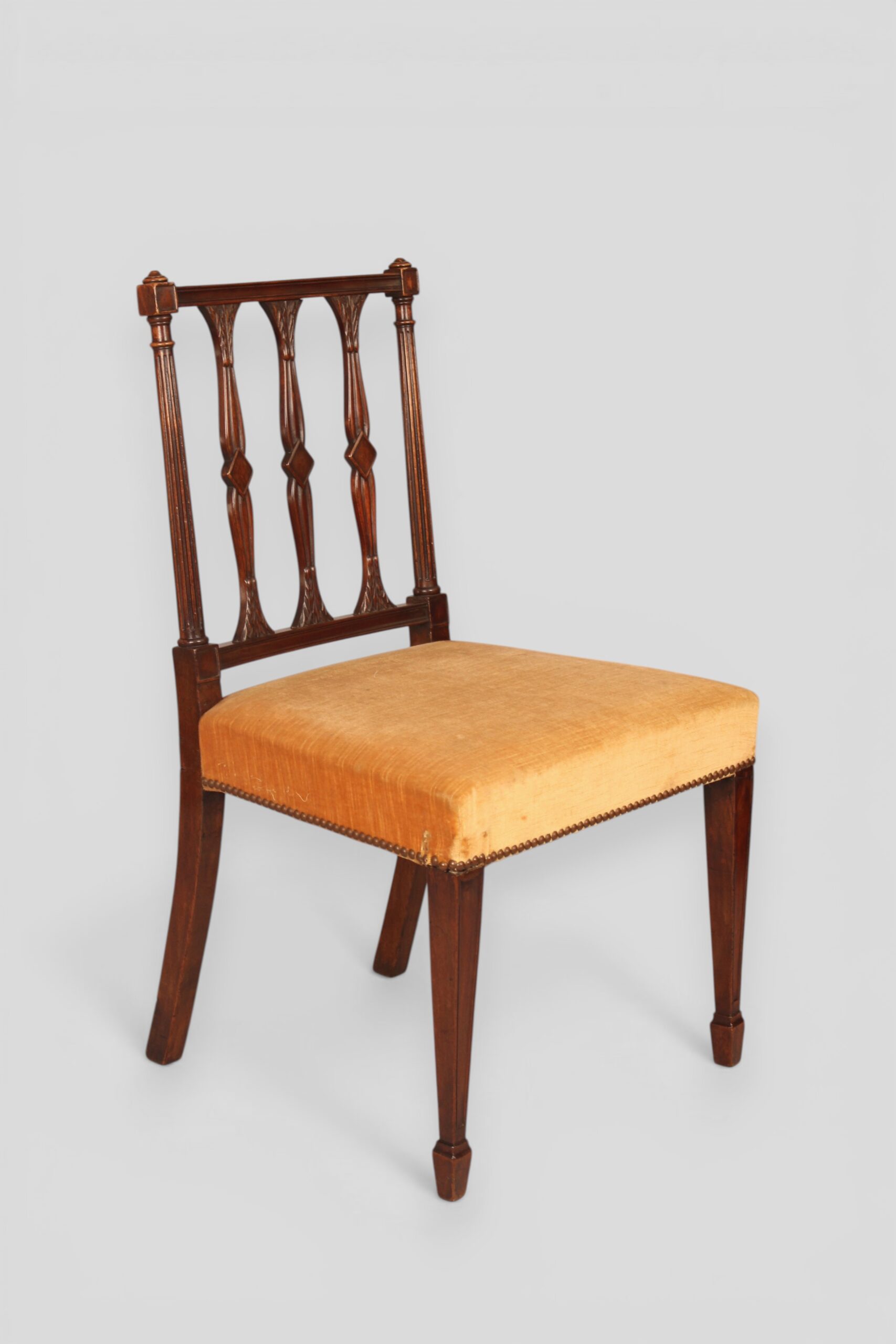 Set of six single and two carvers mahogany dining chairs