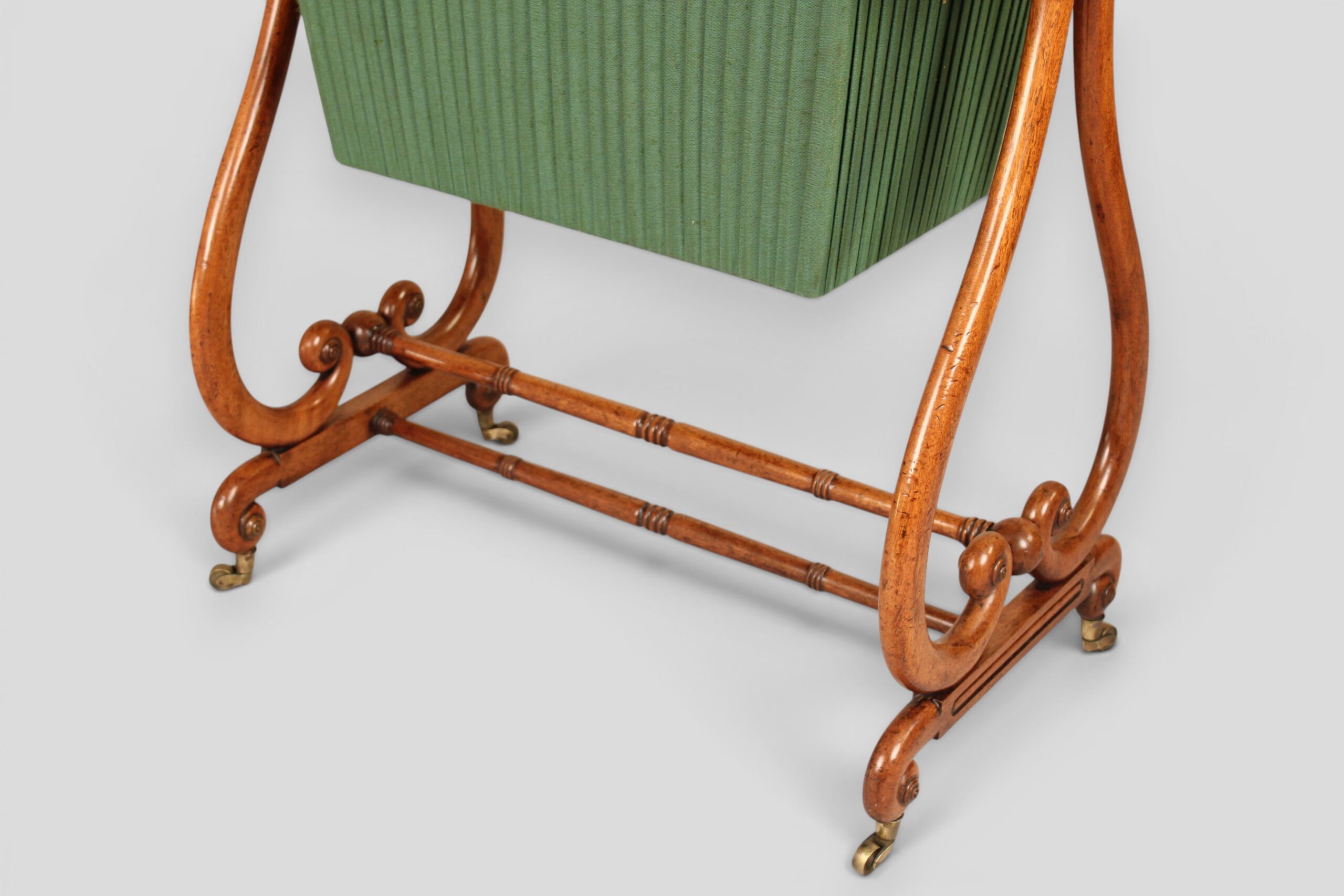 A mahogany lyre-ended work table