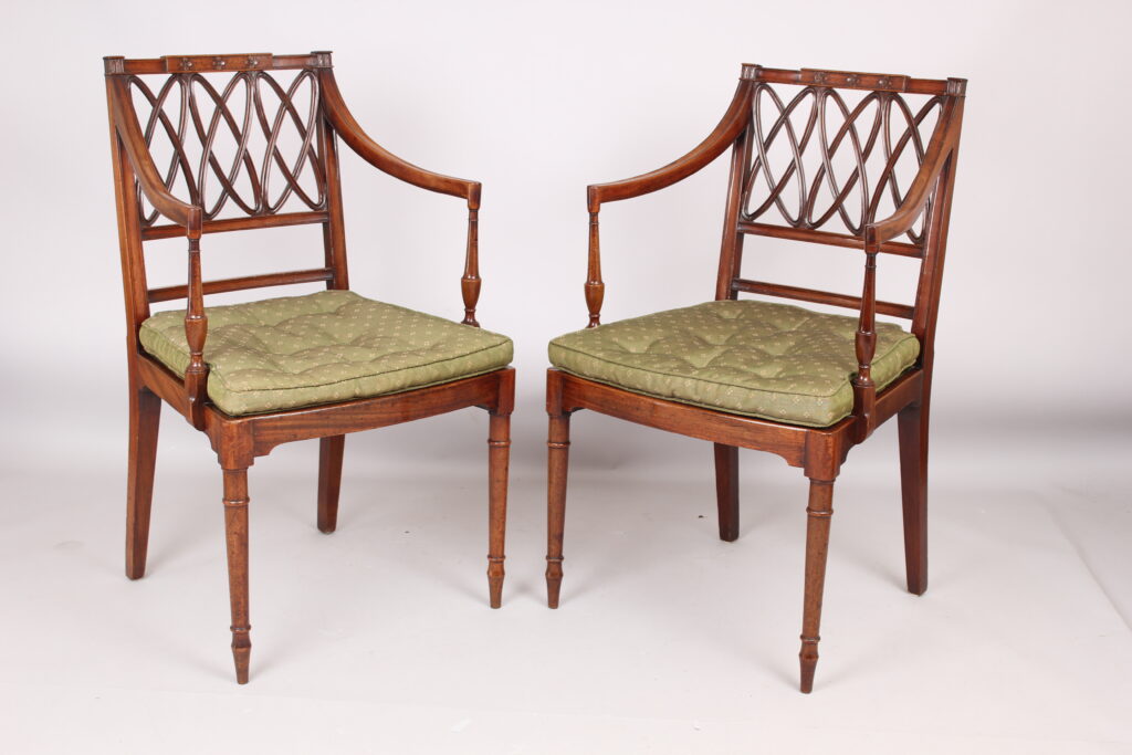 Fine pair of George III period mahogany elbow chairs Sheraton manner